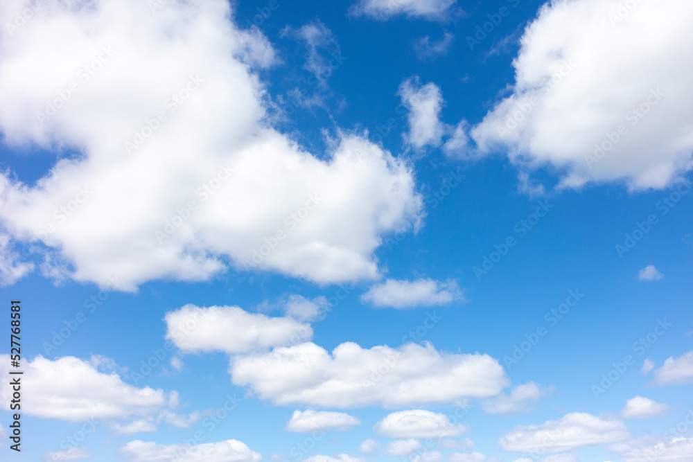 White clouds against the blue sky. White clouds against the blue sky.