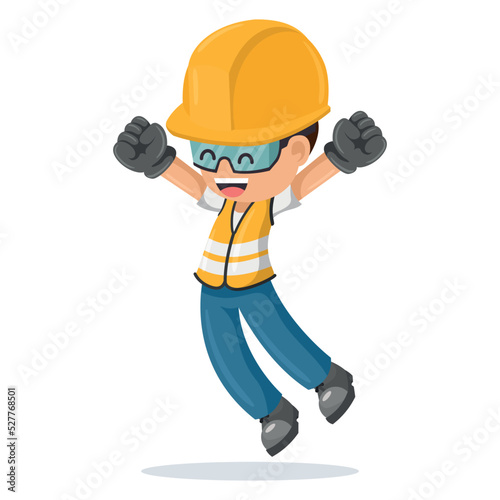 Industrial construction worker jumping happily in his personal protective equipment. Industrial safety and occupational health at work
