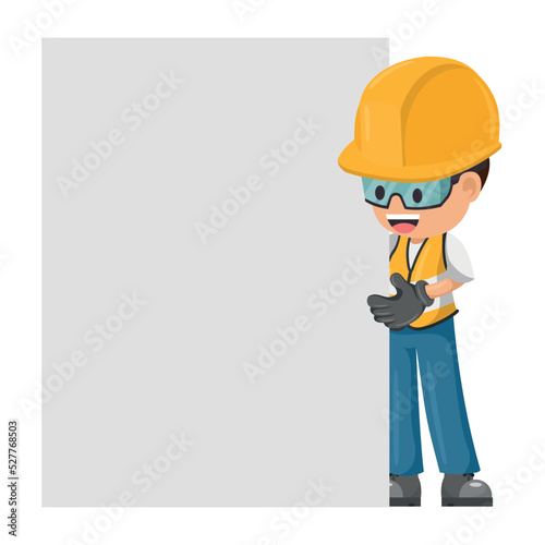 Construction industrial worker holding sign with space for text. Industrial safety and occupational health at work
