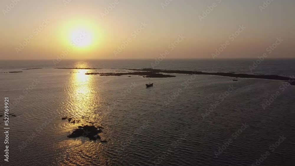 Aerial view of ships docked in mid sea during sunset in Saint Martin Island, Bangladesh Aerial view of ships docked in mid sea during sunset in Saint Martin Island, Bangladesh