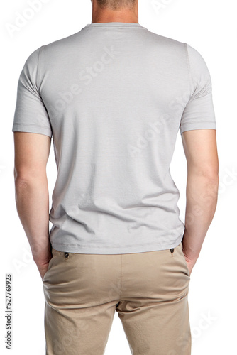 Male model, athletic build in short-sleeve T-shirt chinos grey color and chinos sand color, isolated on a white background. Rear view.