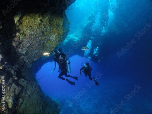 Scuba diving at Blue Hole in Palau. Diving on the reefs of the Palau archipelago.