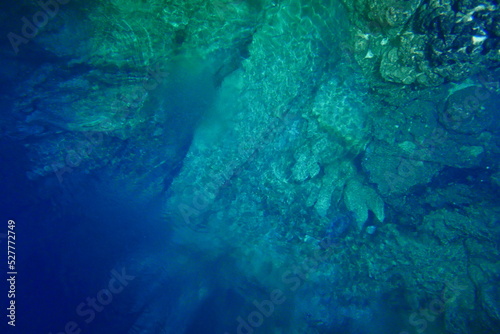 Scuba diving at chandelier cave in Palau. Diving on the reefs of the Palau archipelago. © Optimistic Fish