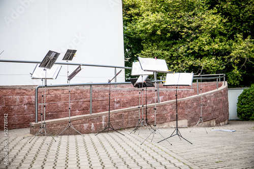 Many music stands for an orchestra in the open air photo