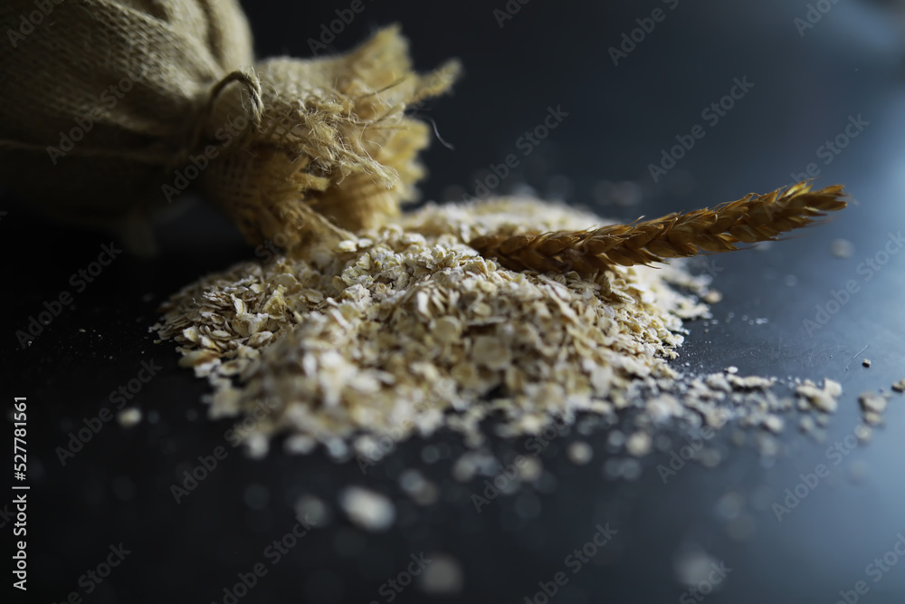 World grain crisis. A handful of cereals and on a dark background. World grain crisis. A handful of cereals and on a dark background.