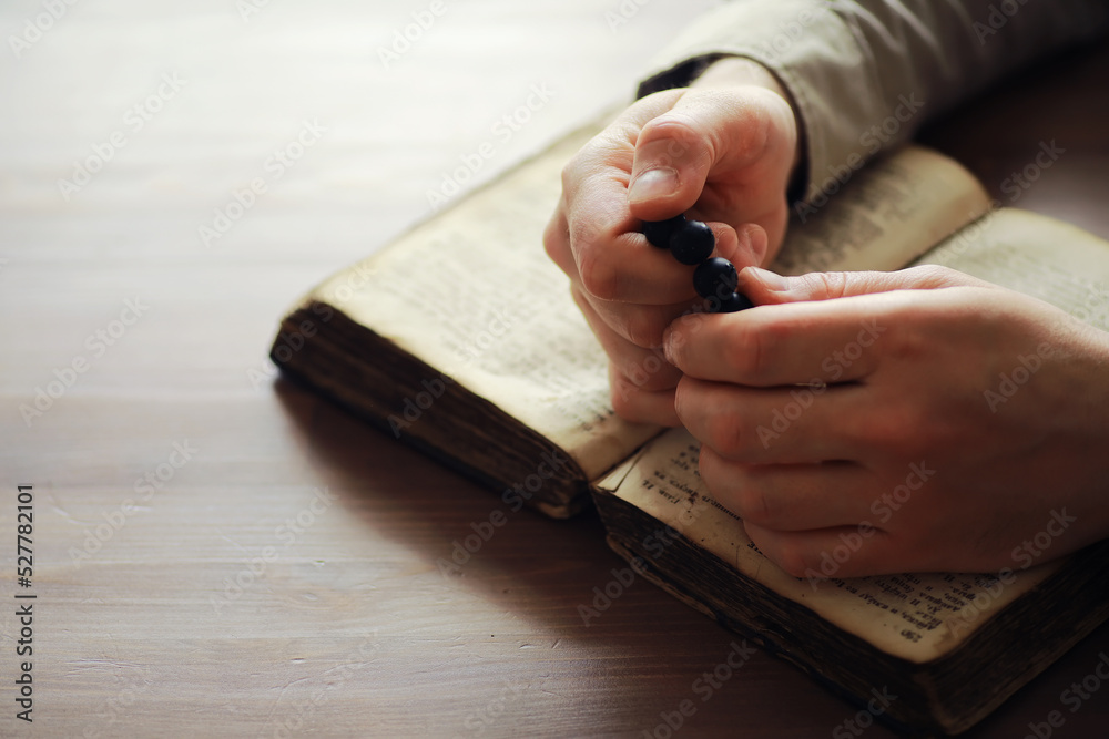 Obraz premium Reading religious literature. Open book. Man reads bible or Koran.