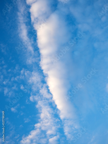 abstract blue sky background with cumulus clouds