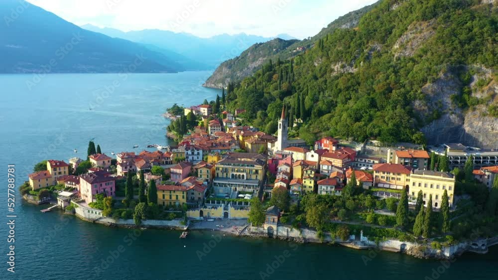 Village of Varenna on Como lake in Italy. Varenna by Lake Como in Italy, aerial view of the old town with the church of San Giorgio in the central square. Famous mountain lake in Italy Village of Varenna on Como lake in Italy. Varenna by Lake Como in Italy, aerial view of the old town with the church of San Giorgio in the central square. Famous mountain lake in Italy