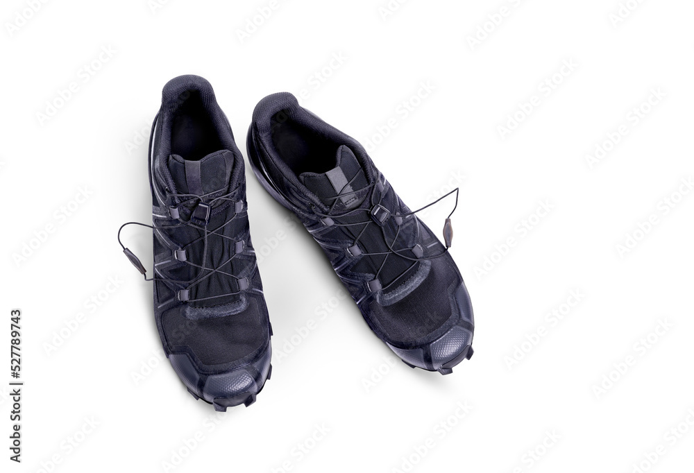 A top view of black trainers, sneakers Isolated on a flat background.