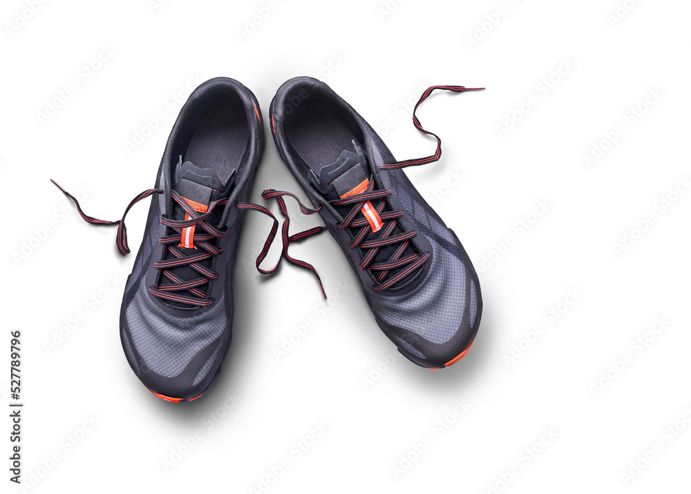 A top view of grey and orange trainers, sneakers Isolated on a flat background.