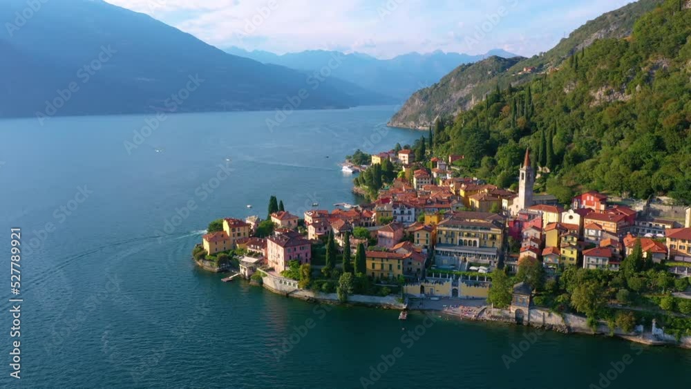 Village of Varenna on Como lake in Italy. Varenna by Lake Como in Italy, aerial view of the old town with the church of San Giorgio in the central square. Famous mountain lake in Italy