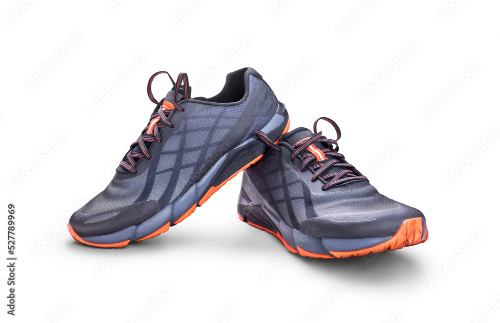 A front view of grey and orange trainers, sneakers Isolated on a flat background.