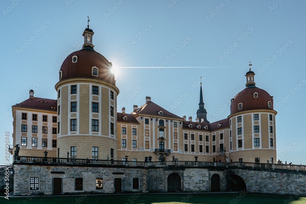 View of fairy tale Moritzburg Castle in Saxony,Germany.Magnificent baroque palace in middle of large pond and park.Popular location for Czech fairy tale movie Three Nuts for Cinderella.