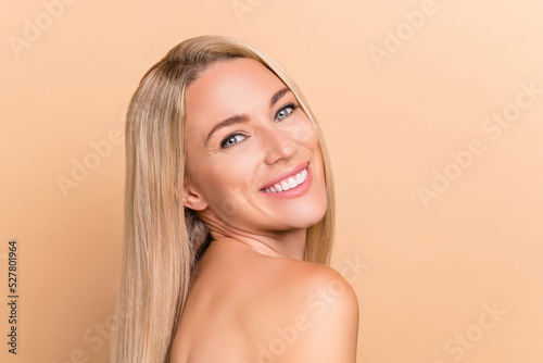Profile side photo of positive lady enjoy spa salon peeling cleansing procedure toothy smiling isolated over beige color background