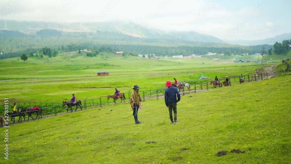 Traveler enjoy in Himalayan Mountains Gulmarg, Jammu and Kashmir, India. Traveler enjoy in Himalayan Mountains Gulmarg, Jammu and Kashmir, India.