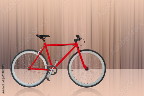 side view red and black and white bicycle on motion and speed brown background, object, fashion, sport, relex, decor, copy space
