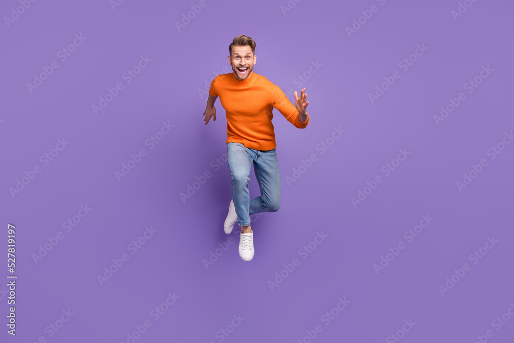 Full body photo of overjoyed laughing man enjoy summer vacation isolated on purple color background
