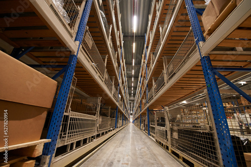 Aisle with shelves in a warehouse