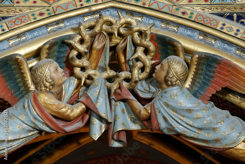 Holy Chapel. Paris. Underside of the arch supporting the relics gallery, decorated with two angels bearing the Crown of Thorns. Sculpture dating from the restoration of the 19th century. photo