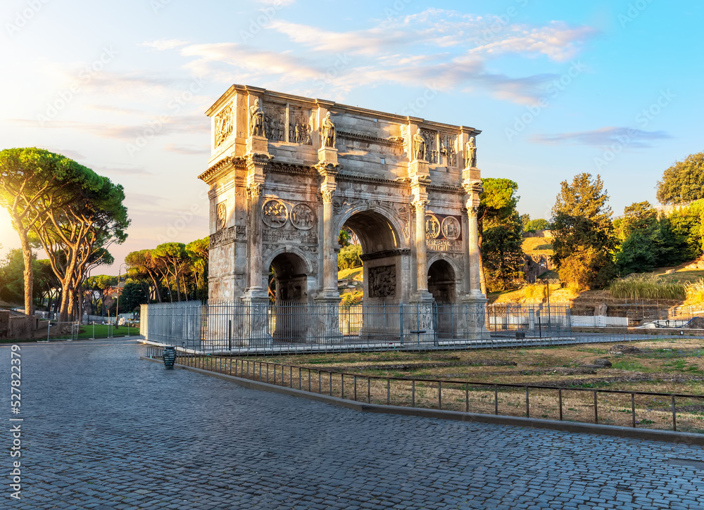 The Arch of Constantine at sunset, famous ancient triumphal arch of Rome, Italy