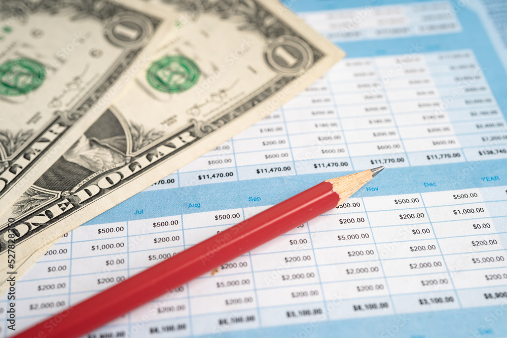 Pencil on spreadsheet paper. Finance, Account, Statistics, Analytic research data economy, Stock exchange trading and Business company meeting concept Pencil on spreadsheet paper. Finance, Account, Statistics, Analytic research data economy, Stock exchange trading and Business company meeting concept