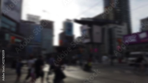 Yonge-Dundas Square, or Dundas Square. Public square at the southeast corner of the intersection of Yonge Street and Dundas Street East in Downtown Toronto, Ontario, Canada. Out of focus. photo