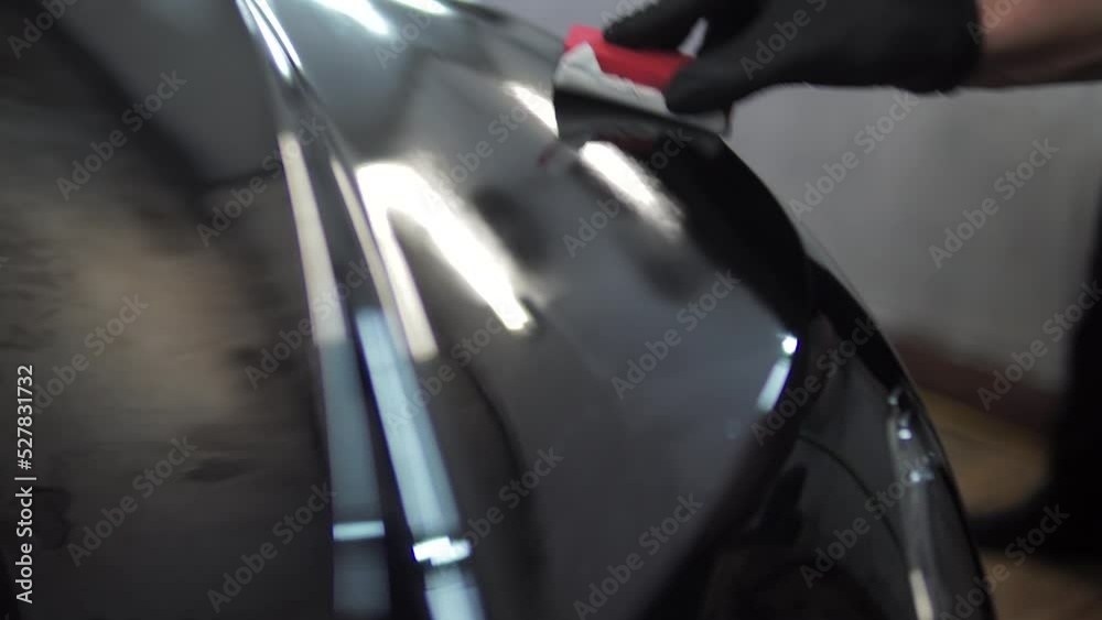 Car wash. Close up of car interior cleaning. Detailing. Polishing car