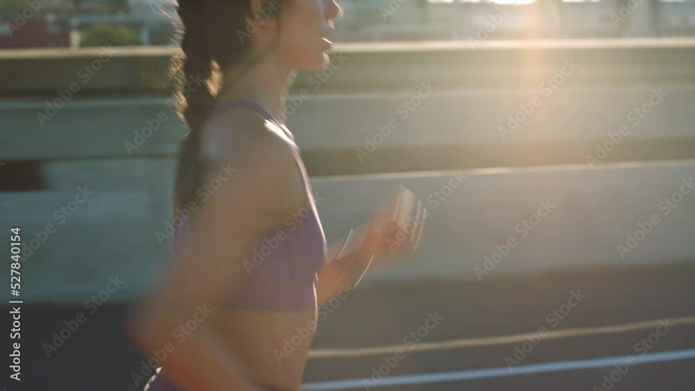 Fitness woman running fast, cardio city training and marathon exercise for speed, strong body and healthy wellness with lens flare. Focus, runner and young athlete in motivation, power and challenge