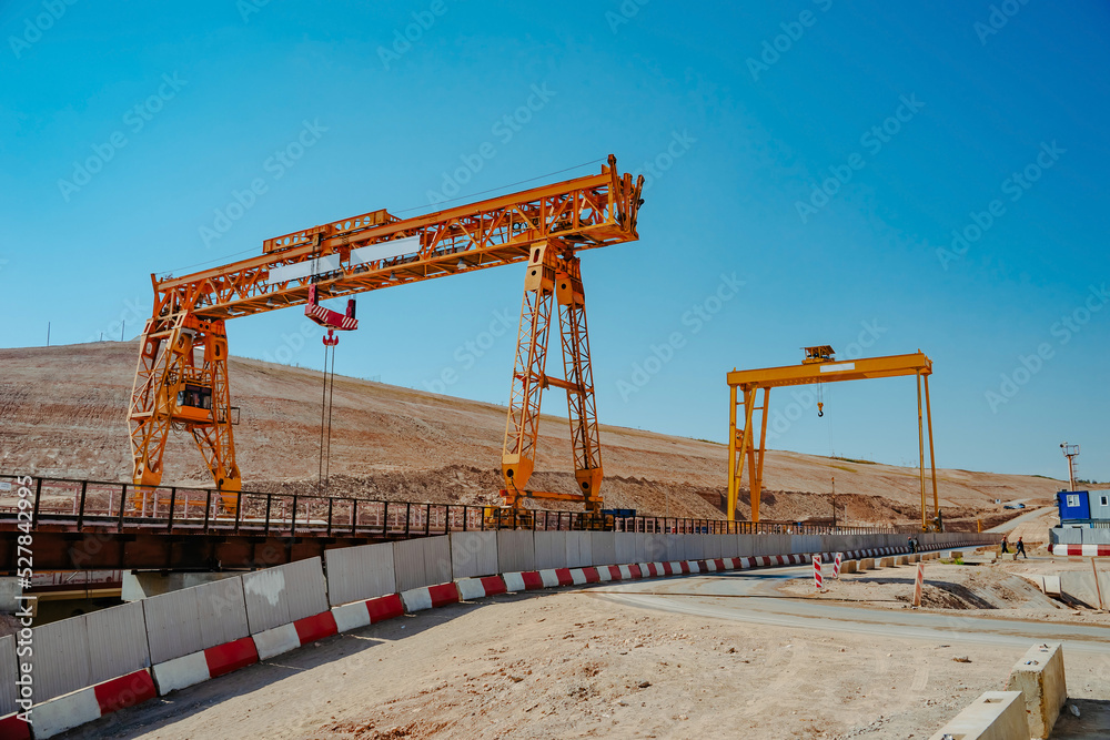 Two gantry cranes on highway construction. Two gantry cranes on highway construction.