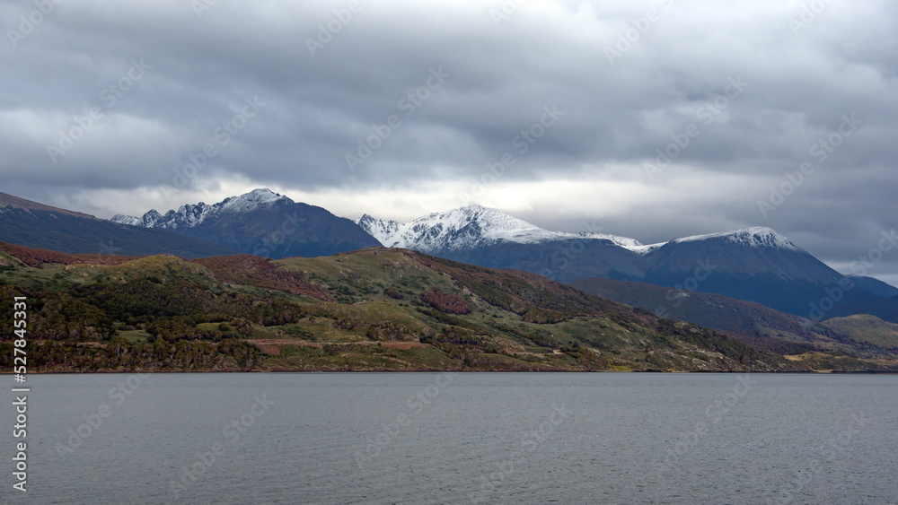 Snow capped Martial Mountains near Ushuaia, Argentina, with the Beagle Channel in the foreground