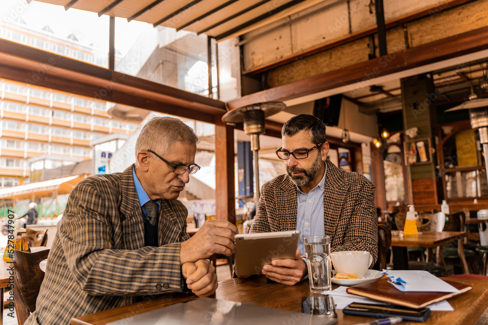 Having a discussion about the documents on the tablet while looking at them