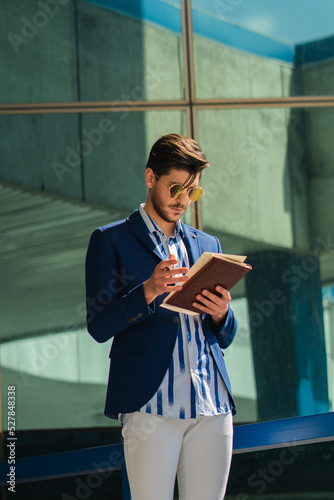 Businessman is having a second look at his ideas photo