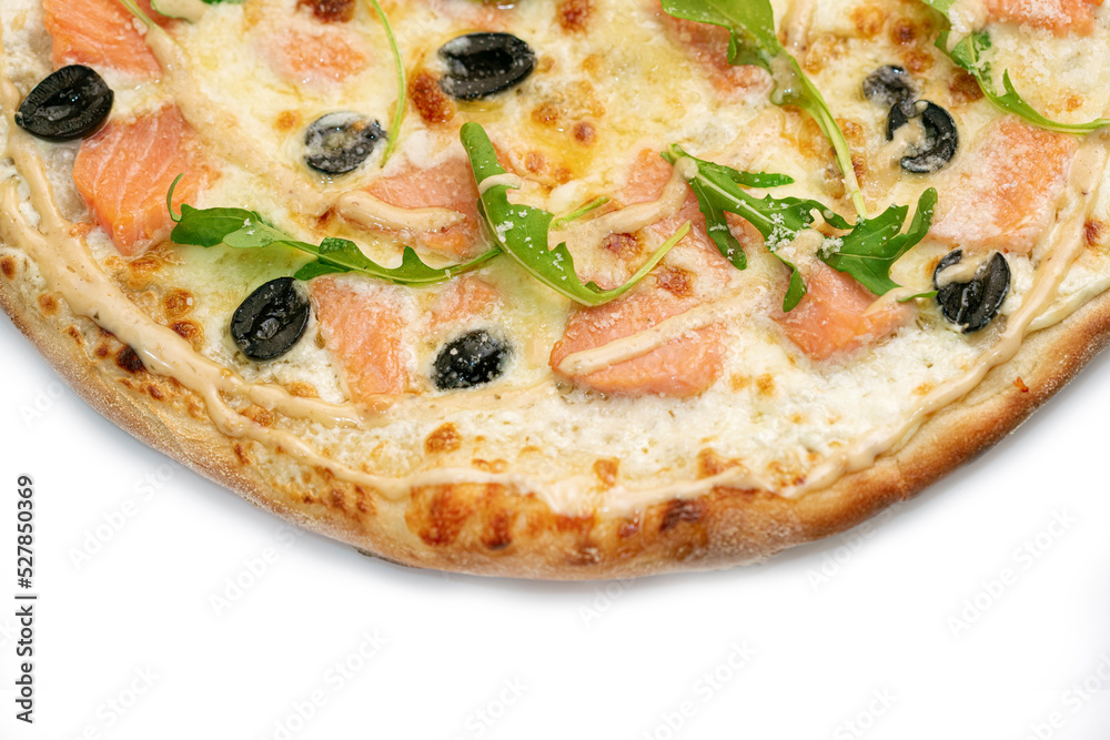 Pizza Close Up with Salmon, olives, gravy and cheese isolated on white background. Copyspace right. Top view