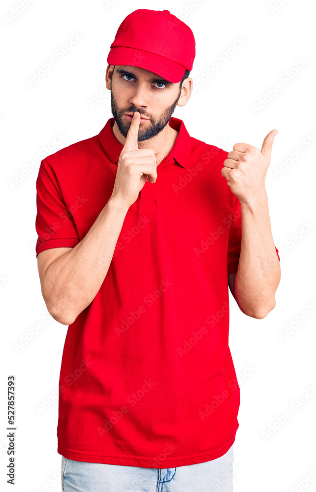 Young handsome man with beard wearing delivery uniform asking to be quiet with finger on lips pointing with hand to the side. silence and secret concept. Young handsome man with beard wearing delivery uniform asking to be quiet with finger on lips pointing with hand to the side. silence and secret concept.