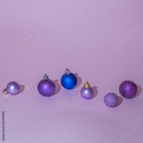 Purple christmas balls, decorations. Flat lay concept. photo