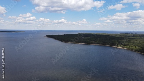 Photo of the Dnieper River from flight altitude, drone shooting. Forest next to the river