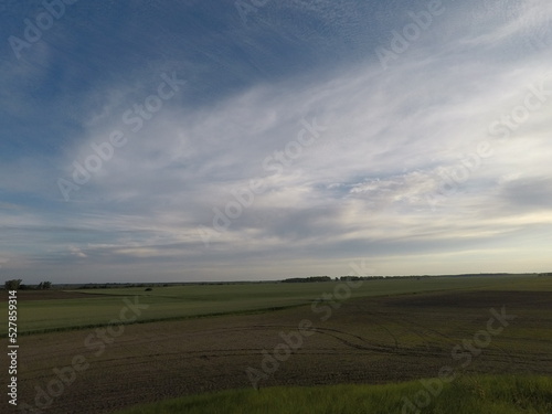 Aerial top view photo from flying drone of a land with down fields in countryside.