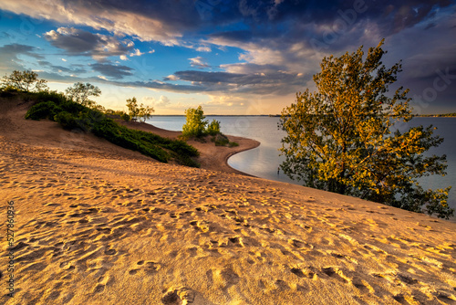Sandbanks Provincial Park Ontario Canada with beautiful sunset landscapes, large bodies of water, waves, and stunning nature scenics