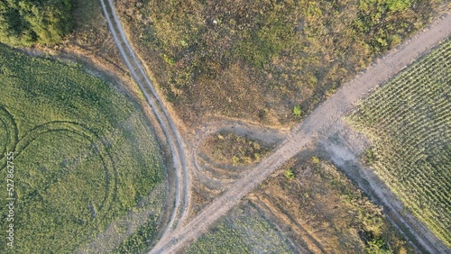 Aerial top view photo from flying drone of a land with down fields in countryside. High quality photo