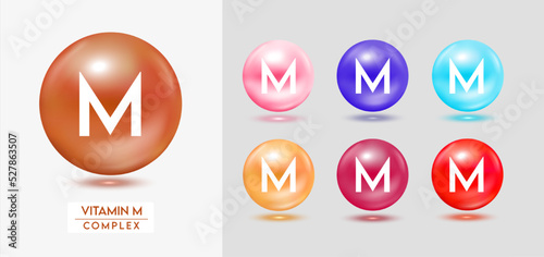 Vitamin M complex. Set of colorful balls multivitamins capsules minerals isolated on grey background. Dietary supplement for pharmacy advertisement, package design. Vector EPS10.
