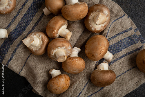 Fresh shiitake mushrooms on textile top view