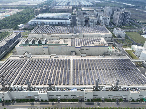 solar panels on factory rooftop © THINK b