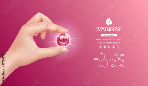 Doctor hand holding vitamin B6 complex capsule purple and structure. Minerals supplement with chemical formula. Medical concept. 3D Realistic vector. photo
