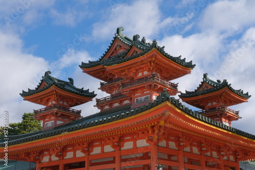 vermillon pagoda of the Heian shrine in Kyoto, Japan, on a bright sunny day with a blue sky
