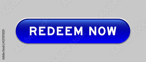Blue color capsule shape button with word redeem now on gray background