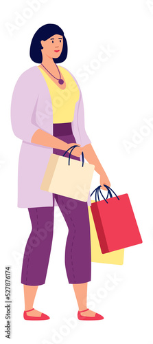 Shopping girl with gift bags isolated on white