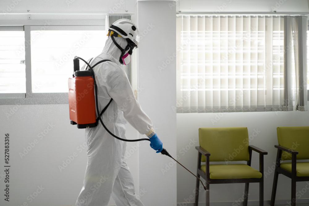 One Firefighter Disinfecting The Interior Of A Building Stock Photo 