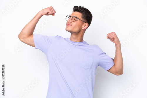 Young caucasian man isolated on white background doing strong gesture