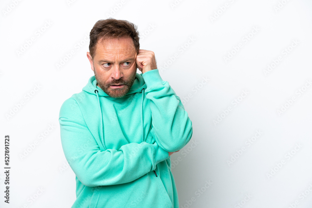 Middle age caucasian man isolated on white background with tired and bored expression Middle age caucasian man isolated on white background with tired and bored expression