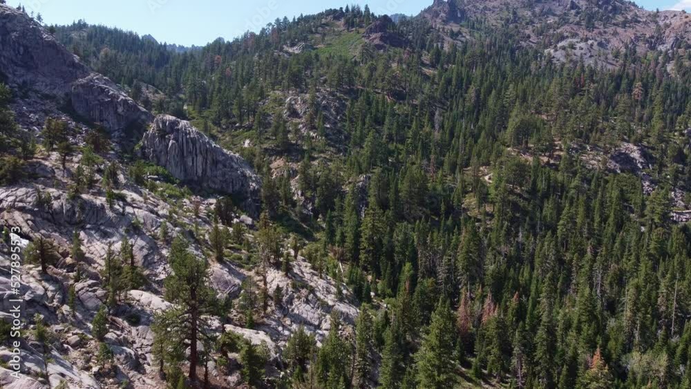 Granite peaks at Ebbetts Pass in california high sierra with waterfall Granite peaks at Ebbetts Pass in california high sierra with waterfall